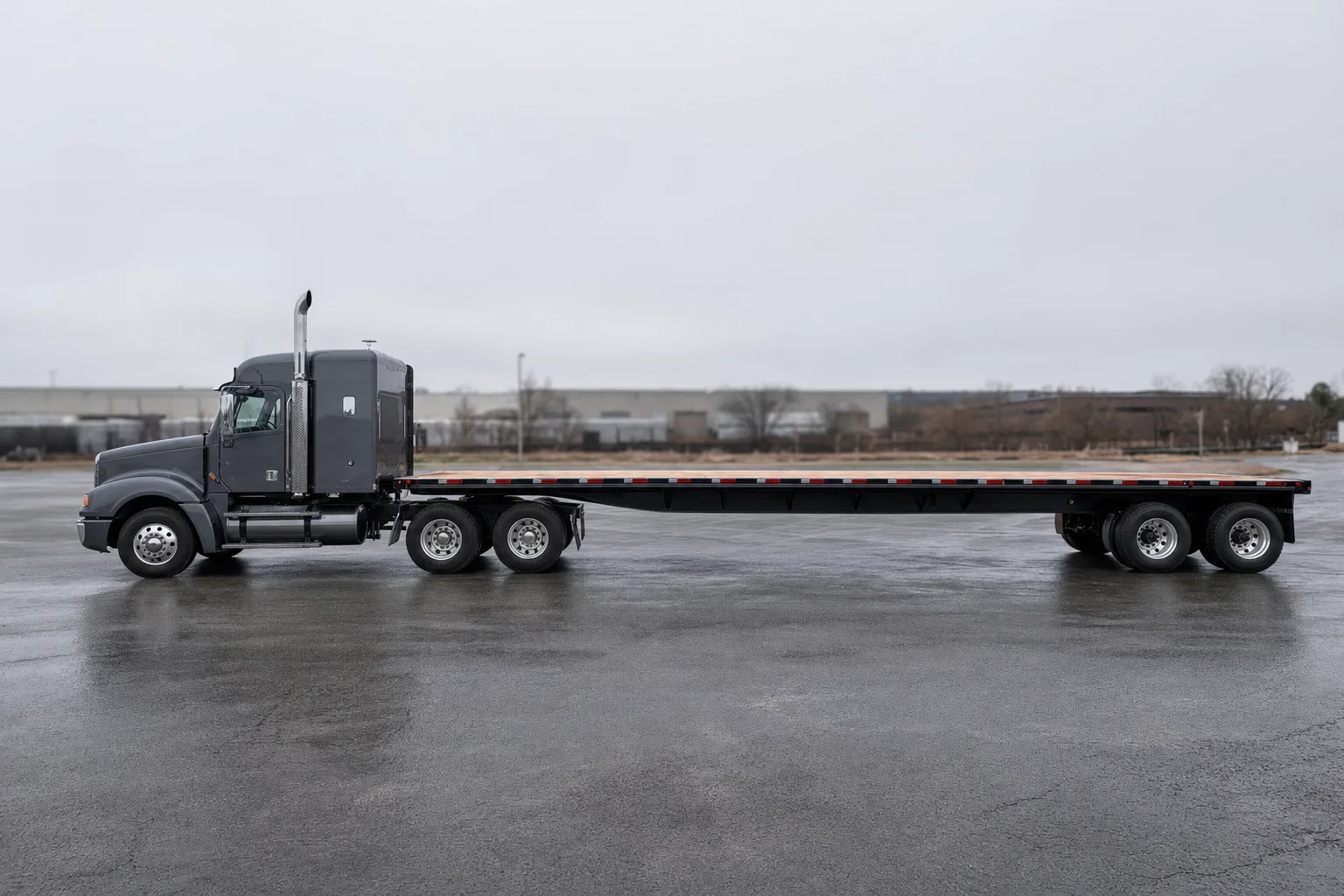 48 foot flatbed trailer with clean wood deck, side profile